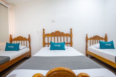 Standard Triple Room | Hypo-allergenic bedding, desk, iron/ironing board, free WiFi