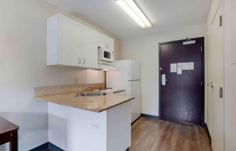 Studio, 1 Queen Bed, Non Smoking | Private kitchen | Full-size fridge, microwave, stovetop, coffee/tea maker