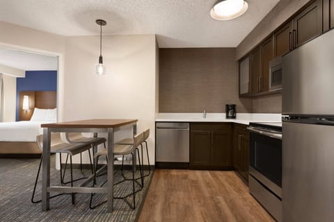 Suite, 2 Bedrooms | Private kitchen | Full-size fridge, microwave, stovetop, dishwasher