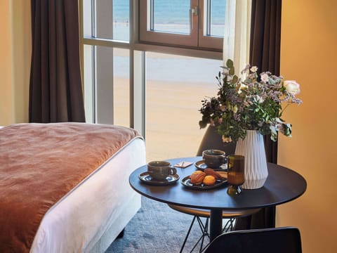 Suite, 1 King Bed, Sea View | In-room safe, desk, blackout drapes, soundproofing