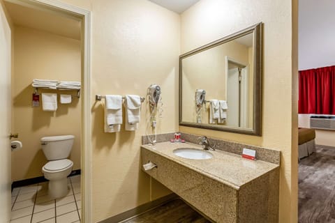 Standard Room, 2 Queen Beds, Non Smoking | Bathroom | Combined shower/tub, hair dryer, towels