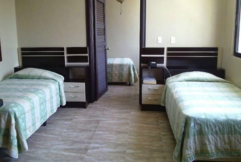 Standard Room, 3 Twin Beds | Down comforters, in-room safe, blackout drapes, free WiFi