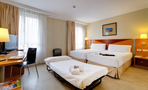 Double Room (2 Adults + 1 Child) | Minibar, in-room safe, individually decorated, individually furnished