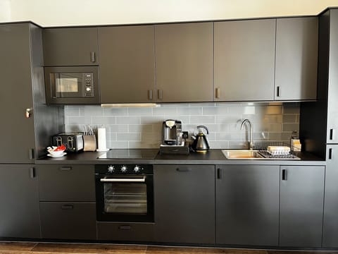 Luxury Apartment, 2 Bedrooms | Private kitchen | Full-size fridge, microwave, oven, stovetop