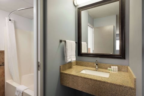 Suite, 2 Queen Beds, Non Smoking (Efficiency) | Bathroom | Combined shower/tub, hair dryer, towels