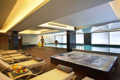 Indoor pool, outdoor pool, pool umbrellas, sun loungers