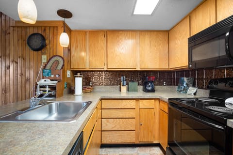 Condo, Multiple Beds, Balcony, Mountain View (#E308 - No Pets Allowed) | Private kitchen | Fridge, microwave, oven, stovetop