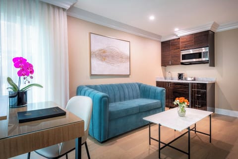 Executive Suite, 1 Queen Bed (Staircase Accessible Only) | Living area | 49-inch Smart TV with cable channels, TV, pay movies