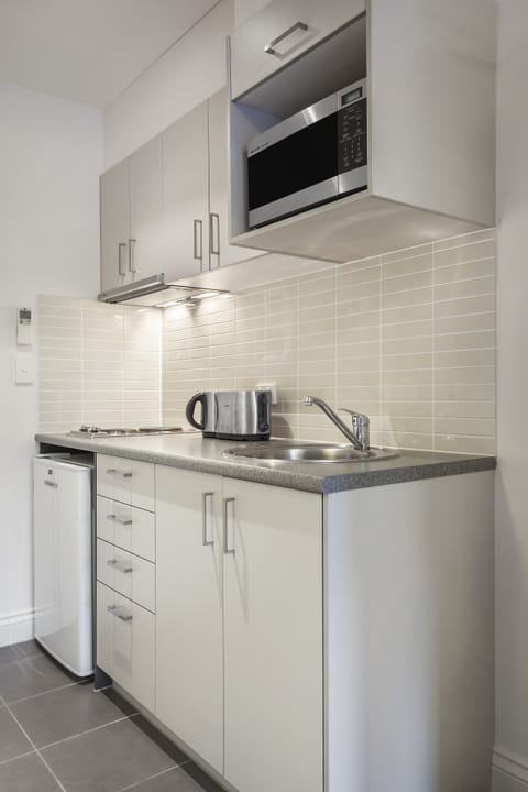 Studio | Private kitchen | Fridge, microwave, stovetop, electric kettle