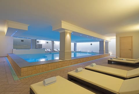 Indoor pool, seasonal outdoor pool, pool umbrellas, sun loungers