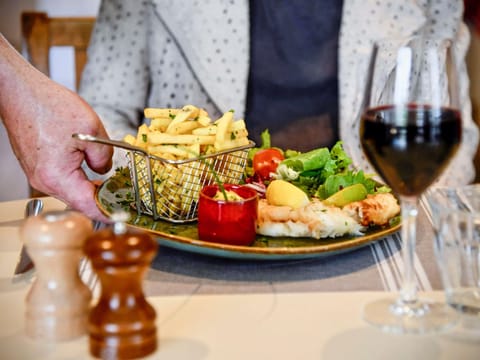 Lunch and dinner served, local cuisine