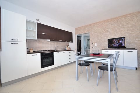 Apartment, 2 Bedrooms (Via Caravaggio) | Private kitchenette | Full-size fridge, cookware/dishes/utensils