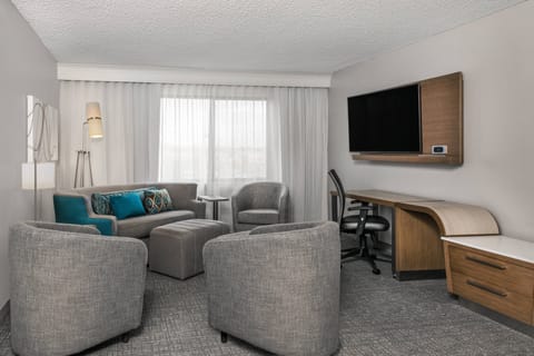 Suite, 1 Bedroom | Living room | LCD TV