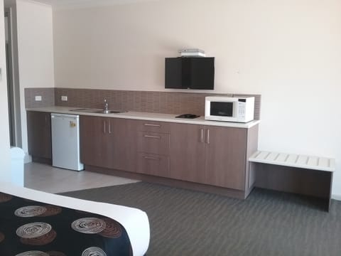 Two Bedroom Family Suite | Private kitchenette | Mini-fridge, microwave, coffee/tea maker, electric kettle