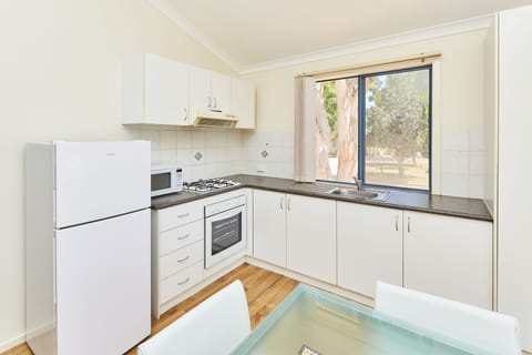  2 Bedroom - Sleeps 6 | Private kitchen | Full-size fridge, microwave, stovetop, coffee/tea maker