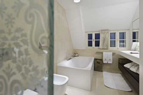 Exclusive Suite, 1 King Bed | Bathroom | Hair dryer, bathrobes, slippers, towels