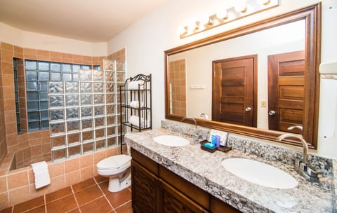 One Bedroom Beach Front | Bathroom | Shower, free toiletries, hair dryer, towels