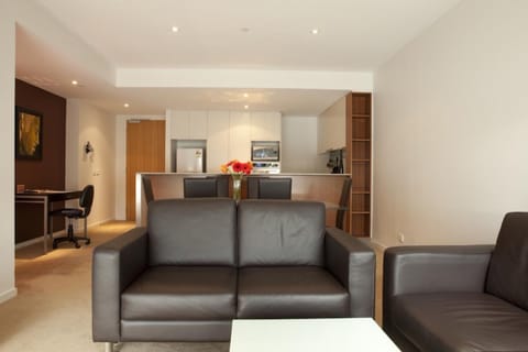 Executive One Bedroom Apartment | Living area | 40-inch flat-screen TV with cable channels, LED TV, iPod dock