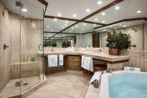 Separate tub and shower, deep soaking tub, designer toiletries