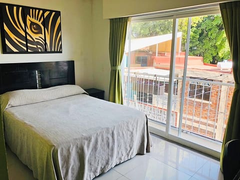 Standard room with air conditioning | Bathroom | Shower, towels, soap, shampoo