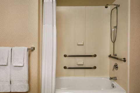 Combined shower/tub, hair dryer, towels, soap