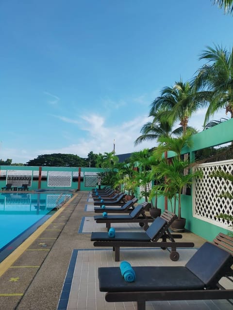 Outdoor pool, open 7:00 AM to 8:00 PM, sun loungers