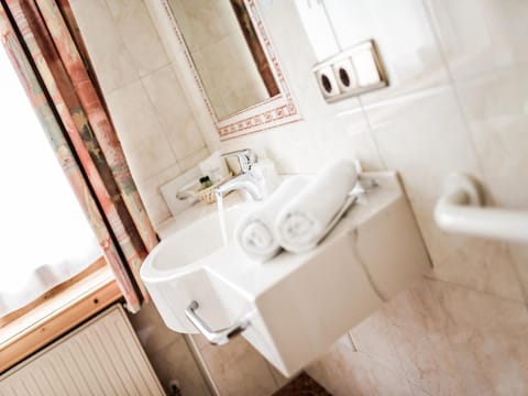 Shower, free toiletries, hair dryer, bathrobes