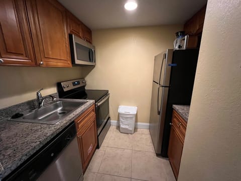 Suite, 1 Bedroom | Private kitchen | Full-size fridge, microwave, oven, stovetop