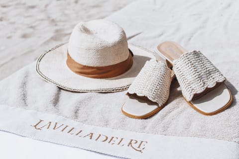 Private beach, white sand, sun loungers, beach umbrellas