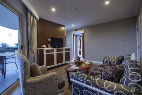 Royal Suite, Hot Tub, Partial Sea View | Living area | 24-inch LCD TV with satellite channels, TV, toys