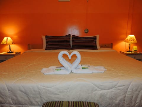 Room, 1 King Bed, Shared Bathroom | In-room safe, individually decorated, iron/ironing board, free WiFi