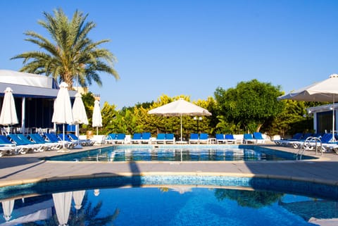 Seasonal outdoor pool, pool umbrellas, sun loungers