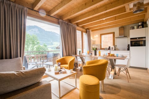 Chalet, 4 Bedrooms | Living area | Flat-screen TV