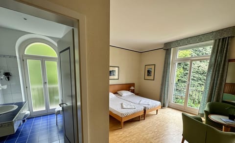 Deluxe Quadruple Room, Lake View | Desk, free WiFi, bed sheets