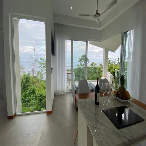 Exclusive Villa, 1 King Bed, Ocean View, Poolside | Private kitchen | Microwave, coffee/tea maker