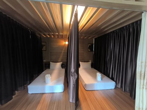 Deluxe Shared Dormitory, Multiple Beds | Individually decorated, blackout drapes, free WiFi, bed sheets