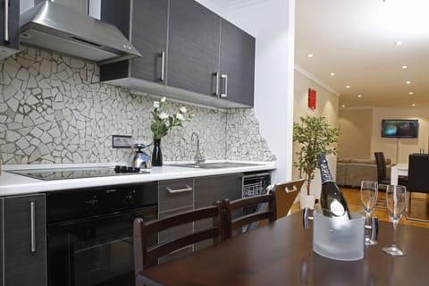 Deluxe Apartment, 2 Bedrooms, Balcony | Private kitchen | Full-size fridge, microwave, oven, stovetop