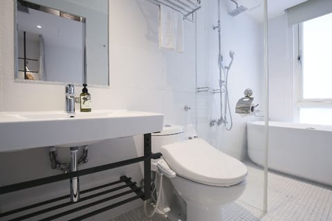 Superior Room | Bathroom | Hair dryer, slippers, bidet, towels