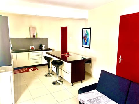 Apartment, 3 Bedrooms | Living area | Flat-screen TV