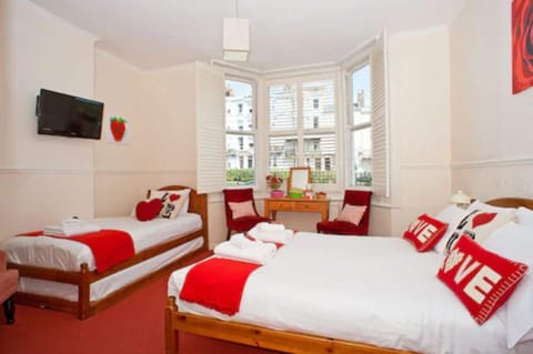 Family Quadruple Room, Private Bathroom, Sea View | Iron/ironing board, free WiFi, bed sheets