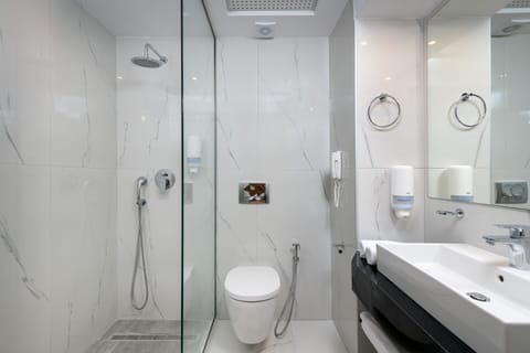 Shower, rainfall showerhead, hair dryer, towels