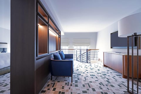 Suite, 1 King Bed | Living area | Flat-screen TV, pay movies, MP3 dock