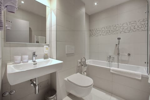 Comfort Double Room | Bathroom | Designer toiletries, hair dryer, towels