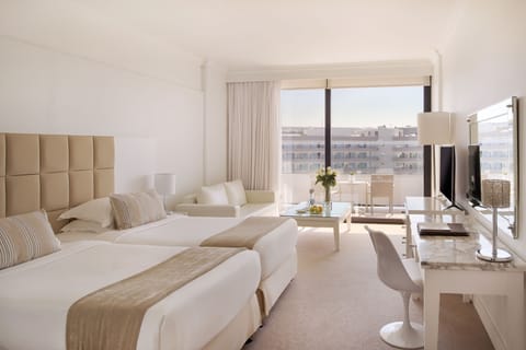 Standard Studio, Partial Sea View | Minibar, in-room safe, desk, laptop workspace