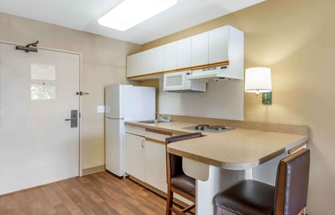 Studio, 1 King Bed, Non Smoking | Private kitchen | Fridge, microwave, stovetop