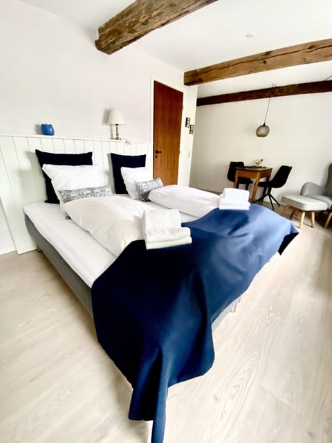 1 bedroom, premium bedding, down comforters, individually decorated