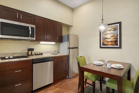 Suite, 1 Bedroom | Private kitchen | Full-size fridge, microwave, stovetop, dishwasher