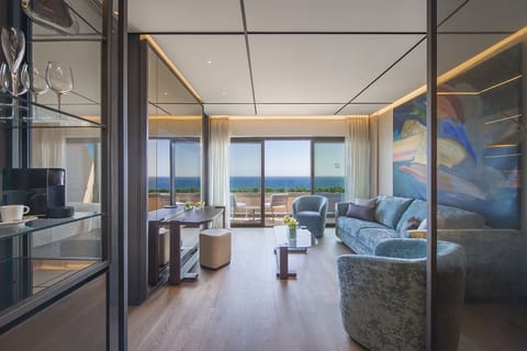 Signature Suite, Sea View | Living area | TV