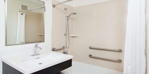 Combined shower/tub, hair dryer, towels, soap