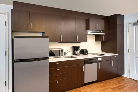 Suite, 1 Bedroom | Private kitchen | Full-size fridge, microwave, stovetop, dishwasher